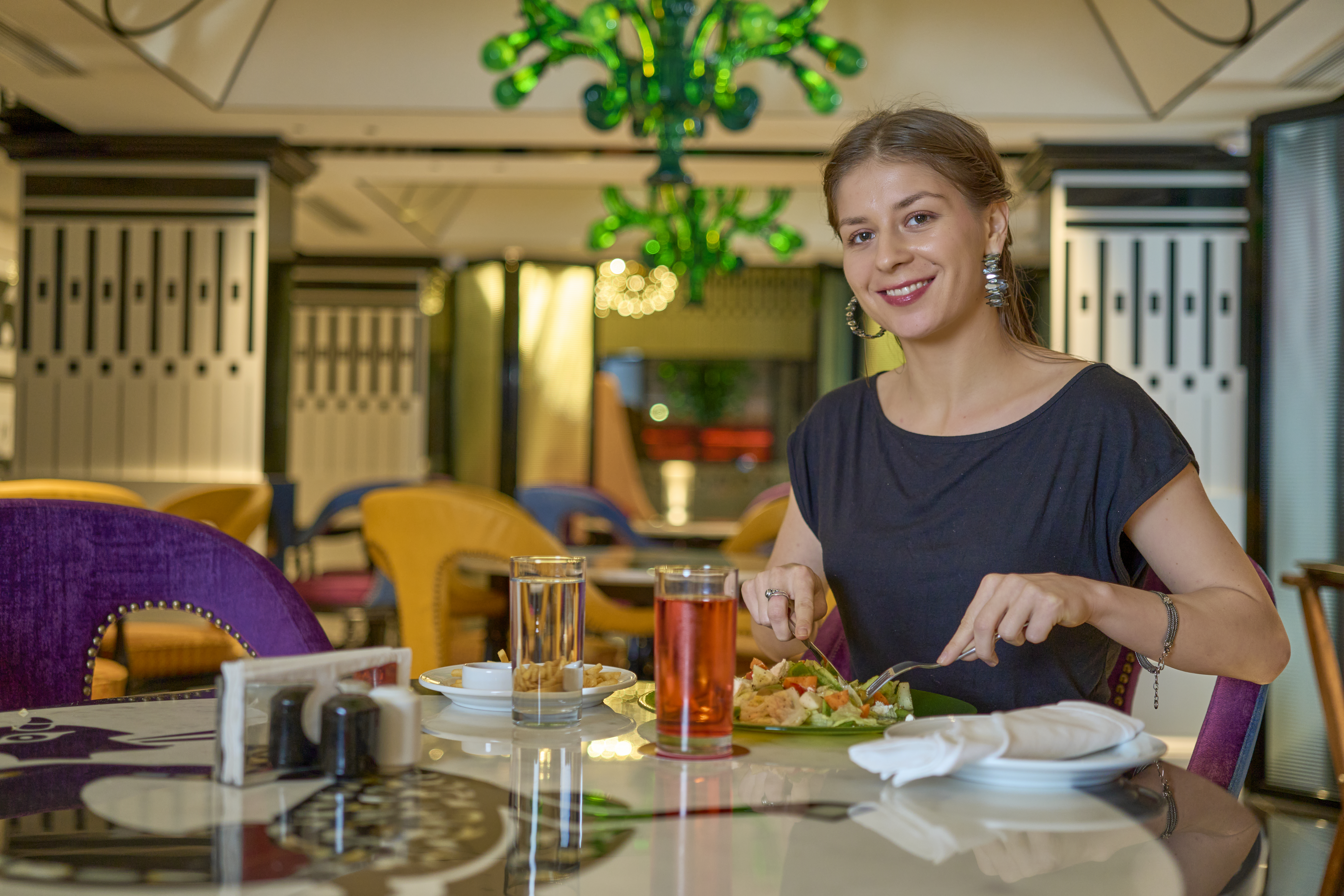 Our Guest Enjoying Delicious Food at NOAH Sky Suites Restaurant - Vibranz