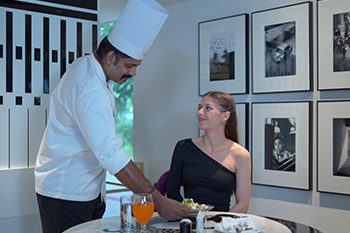 Our Chef Serving Food to our Beloved Guests at NOAH Sky Suites Restaurant Vibranz