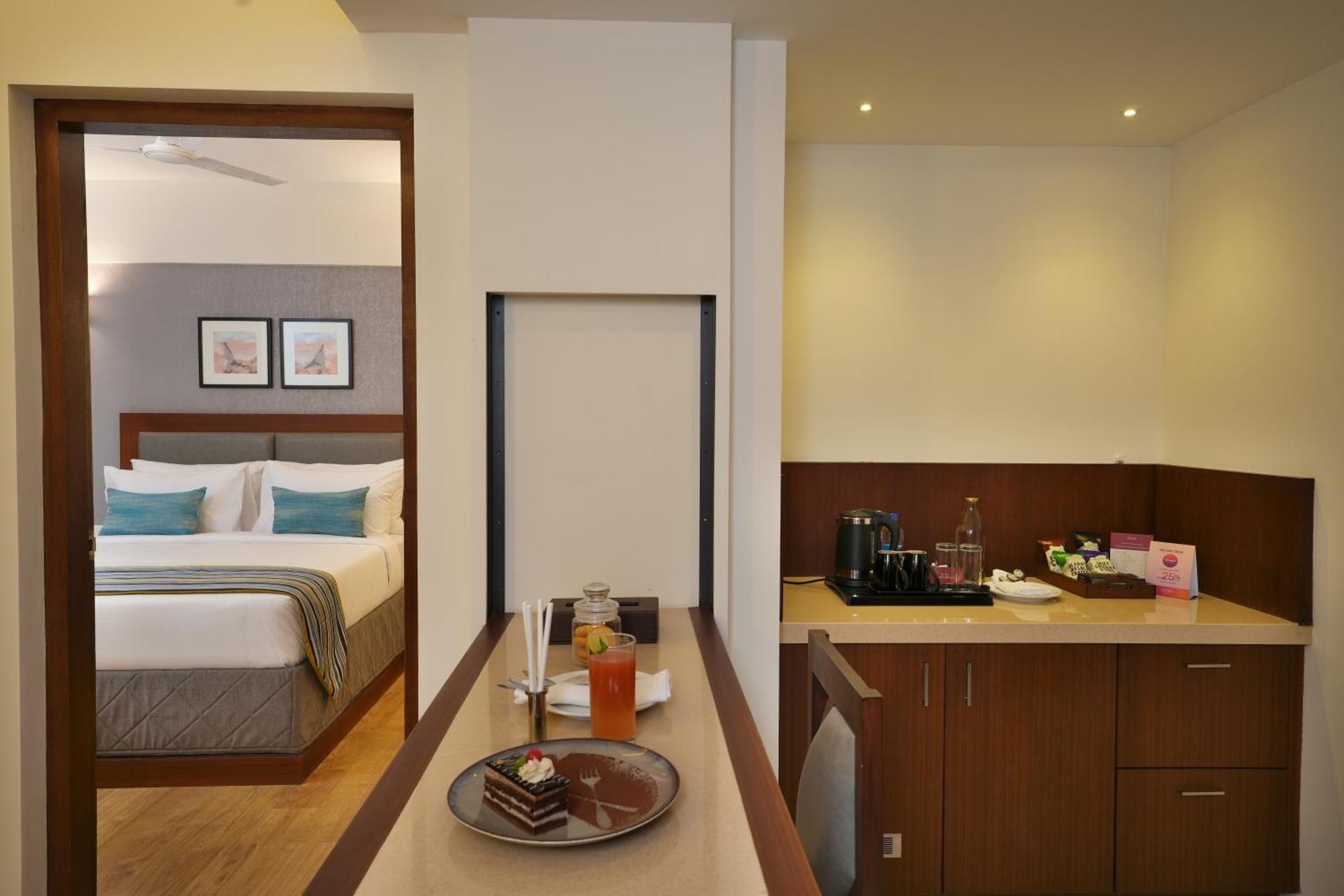 Two-bedroom Premium Suite for families near Cochin International Airport" "Family stay at Noah Sky Suites, Nedumbassery, 4 km from Kochi airport